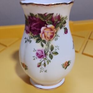 White and Purple Vase with Floral Accents